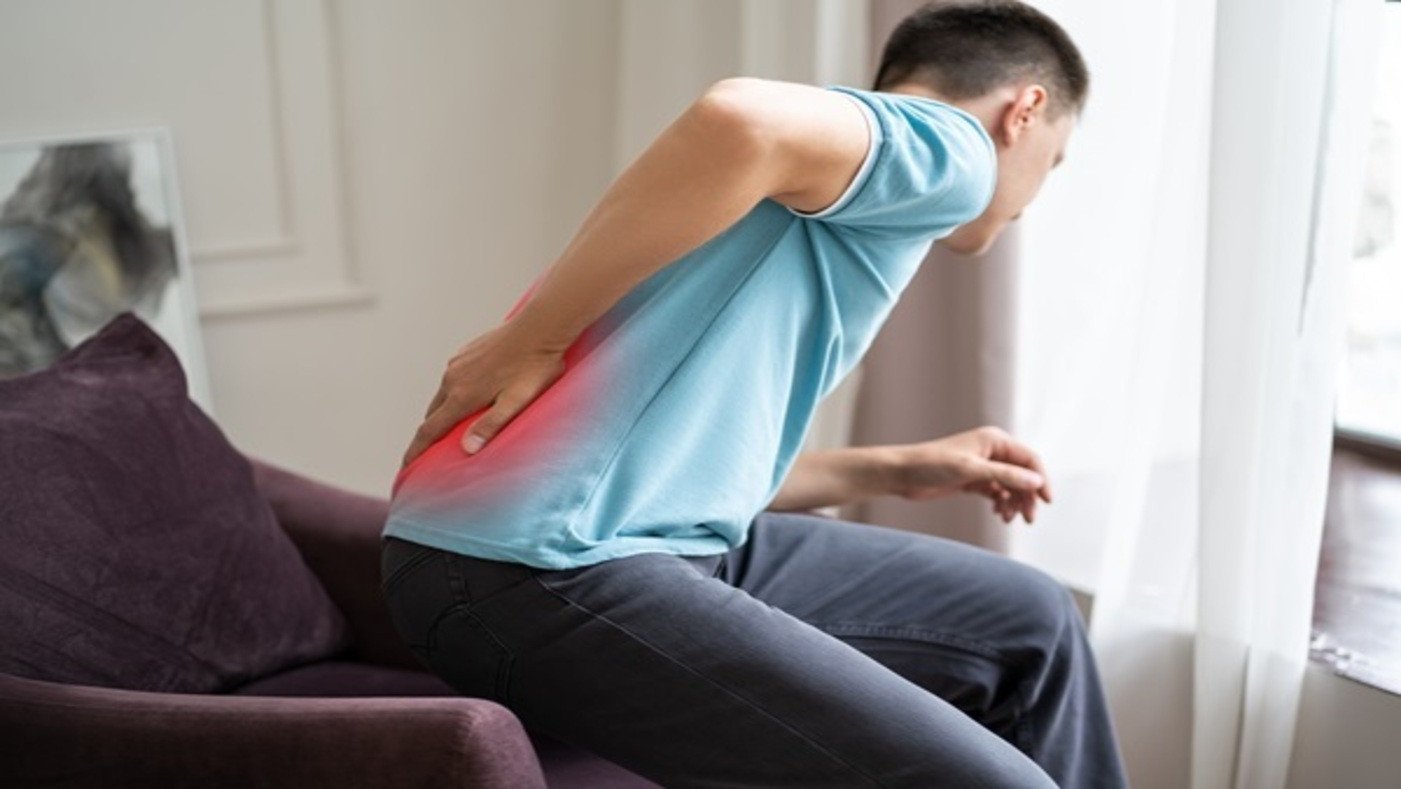 orthopedic specialist Dr. Dibya Singha treating back pain